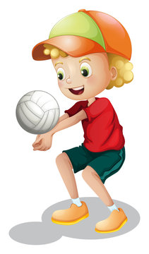 A young boy playing volleyball