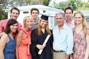 Female Student And Family Celebrating Graduation