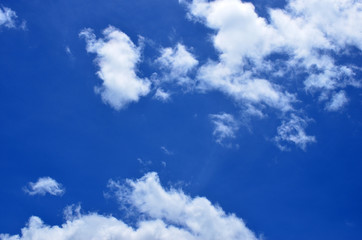 White clouds in blue sky.