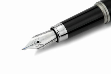 Fountain pen on white background, close up image