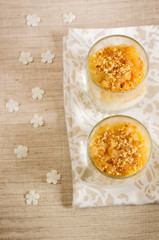creamy dessert with caramelized pears and nuts