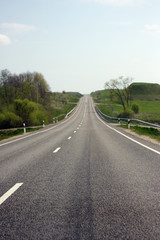 Country road in Europe at summer time