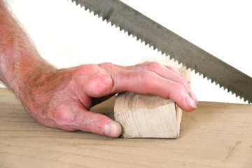 Joiner without one finger sawing a piece of wood - 65581241
