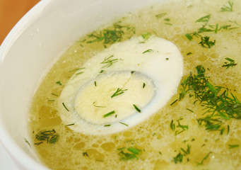 Chicken broth with dill and egg.