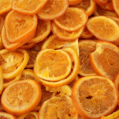 candied orange fruit slices as background