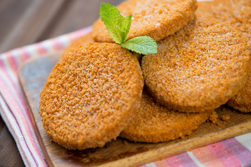 Close-up of raw salmon cakes, horizontal shot