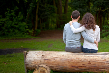 Portrait of a young happy couple in the nature