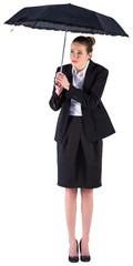 Businesswoman holding a black umbrella