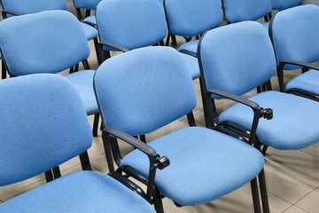 Obraz premium blue chairs in office meeting room
