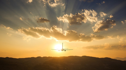 Airplane on sunset
