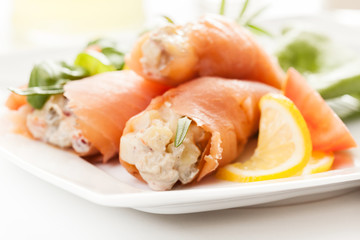 Smoked salmon roll with vegetable salad