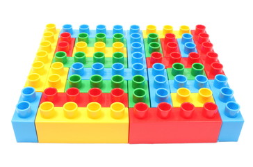 Colorful building blocks for children on white background