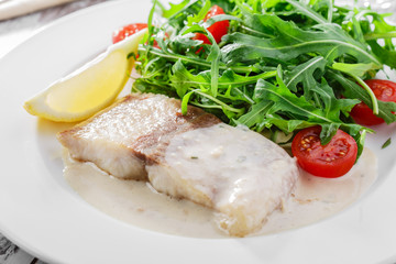 fish fillet in white sauce  Pangasius