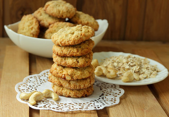 Freshly baked oatmeal cookies, stacked.