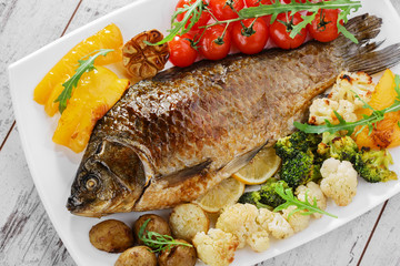baked fish with vegetables  carp - 65604025