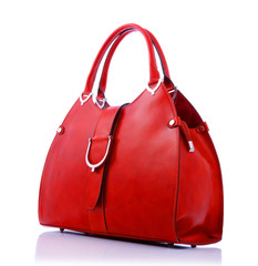 Red handbag on white background - obrazy, fototapety, plakaty