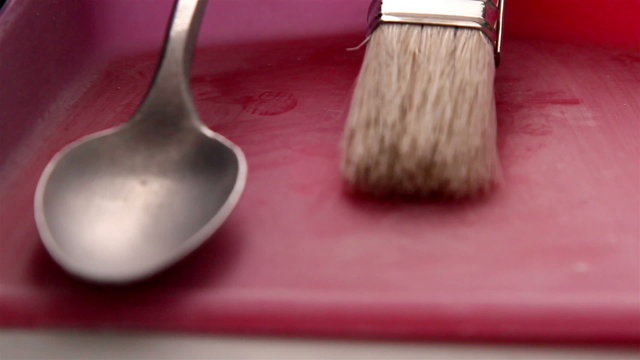 A fork and a brush