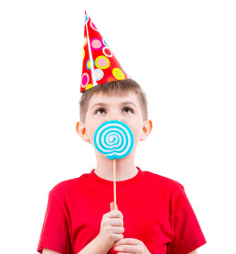 Boy In Red T-shirt Eating Colored Candy.