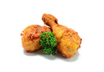 Golden brown fried chicken drumsticks