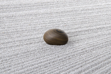 Beautiful pebble on sand carpet