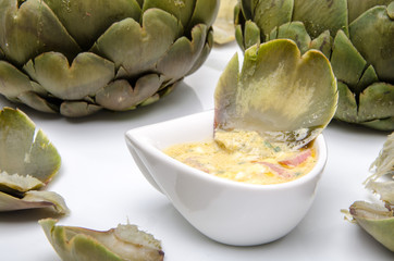 Artichoke's leaf dipped in a vinaigrette
