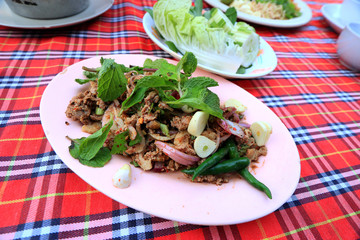 Spicy salad and duck meat - asia food.