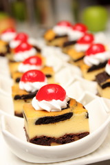 brownie cheese cake on white cup