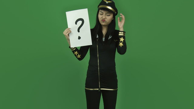Asian air hostess isolated greenscreen green background confused