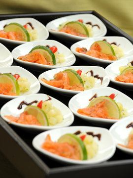 Smoked salmon appetizers on a buffet table