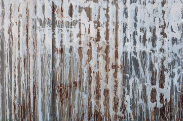 rusted galvanized iron plate texture with white stain on wall