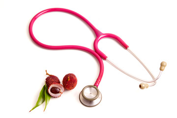Lychee. Fresh lychees and Doctor's stethoscope.