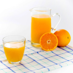 Fresh squeezed orange juice, on kitchen table.