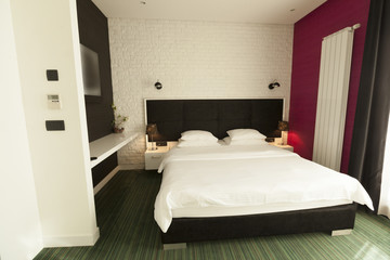 Naklejka na ściany i meble Interior of a hotel bedroom