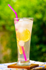 Glass of fresh and cold lemonade for two.