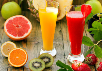 Strawberry and pineapple smoothies in cocktail glasses