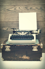 typewriter on wooden background