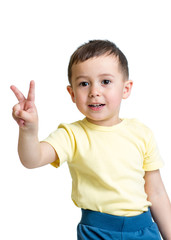 kid boy showing victory hand sign on white background