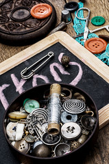 buttons on the background of sewing tool