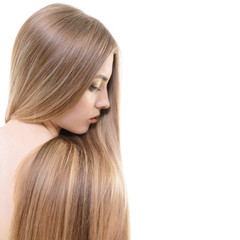 Hair. Beautiful bond girl with healthy long hair. Haicare and ha