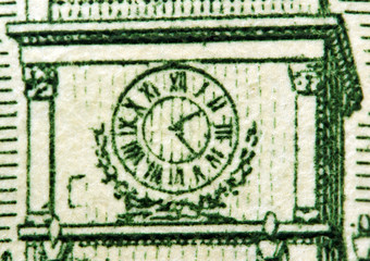 Dollar USA, clock. Extreme closeup.Macro
