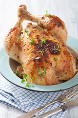 whole roasted chicken with pepper and thyme