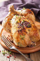whole roasted chicken with pepper and thyme