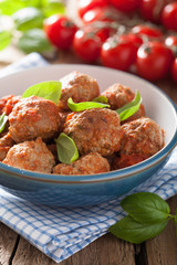 meatballs with tomato sauce in black pan