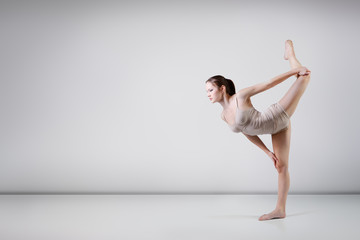 young beautiful dancer teen girl dancing and jumping, studio ser