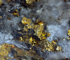 Crystal,nugget, gold, bronze, copper, iron. Macro. Extreme close