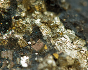 Crystal,nugget, gold, bronze, copper, iron. Macro. Extreme close