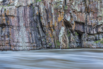 rock cliff and whitewater river