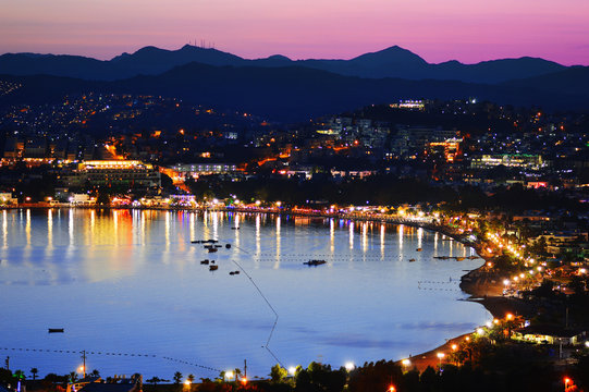 View of Gumbet Bay by night. Turkish Riviera.