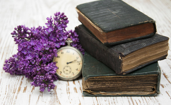 Old Books  and lilac branch