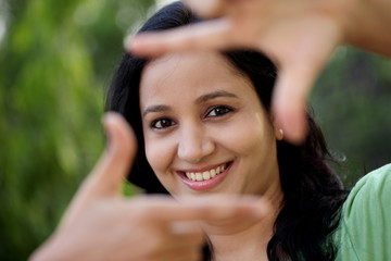 Woman making frame with her hands